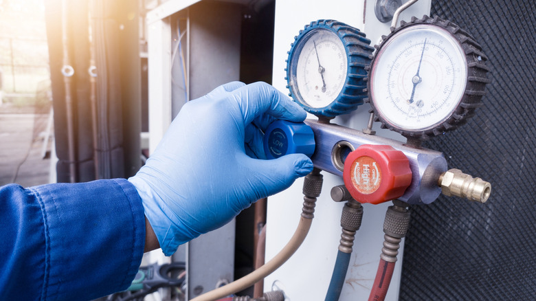 HVAC system refrigerant gauges hooked up.