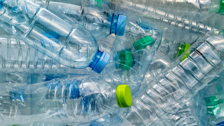 A bunch of plastic water bottles