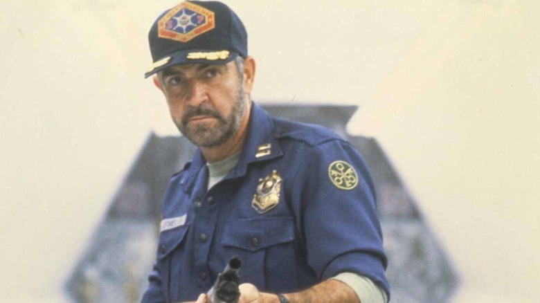 William T. O'Niel (Sean Connery) aiming a shotgun