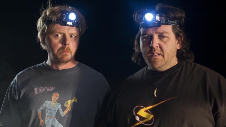 Graeme (Simon Pegg) and Clive (Nick Frost) wearing head torches in Paul