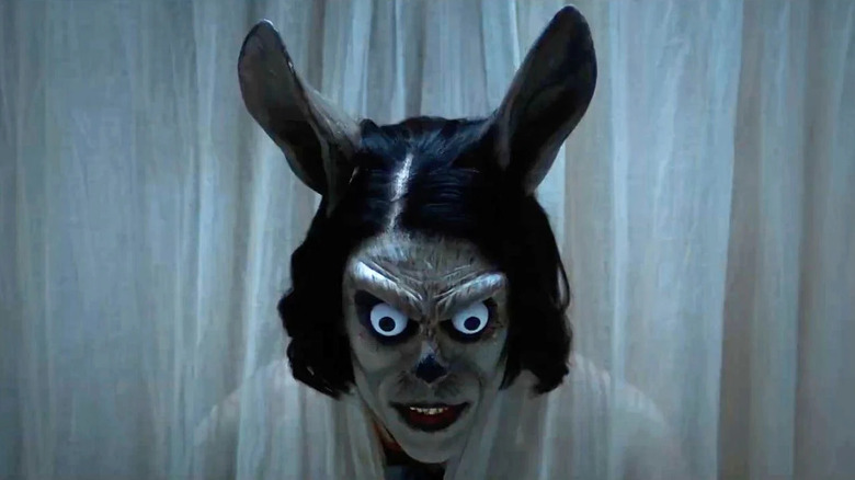 A creepy bunny-eared monster.