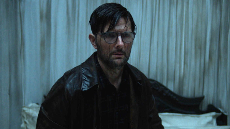 A damp, dirty, Adam Scott in Hokum