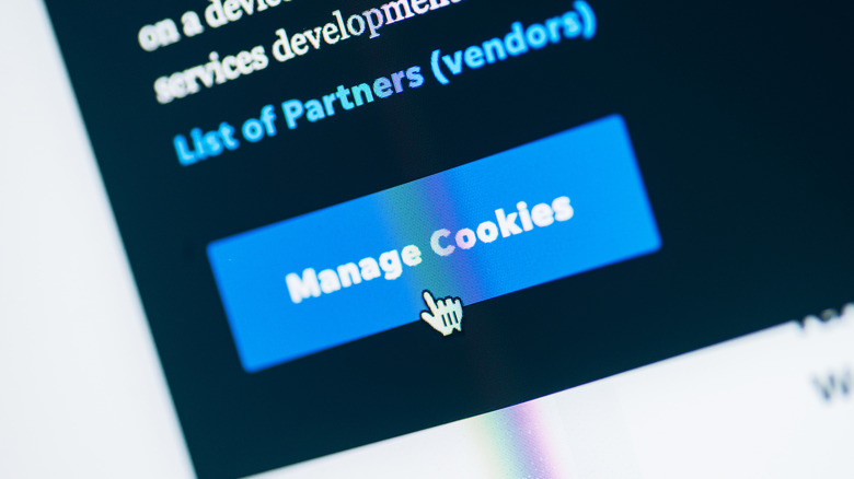 A mouse icon clicking the Manage Cookies button on a webpage