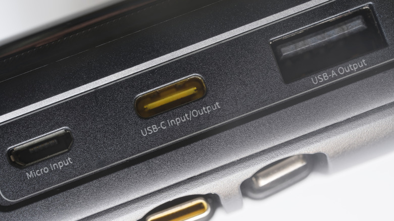 Zoomed-in view of various input and output ports, including USB-C and USB-A