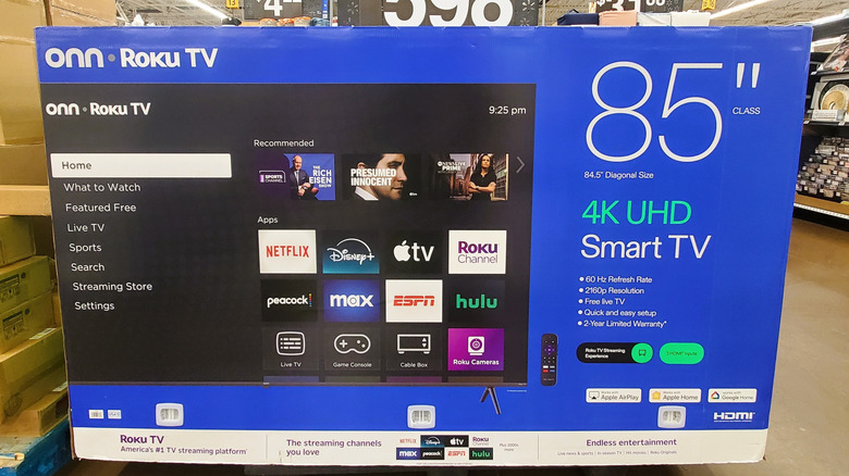 The Onn 85-inch 4K Roku Smart TV is pictured in a Walmart store.