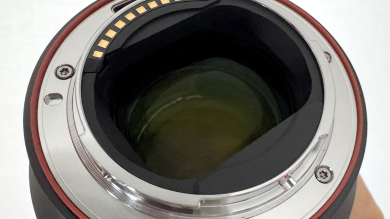 The rear of a digital camera lens.