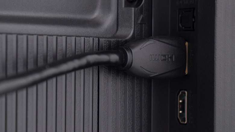 An HDMI cable connected to a TV.