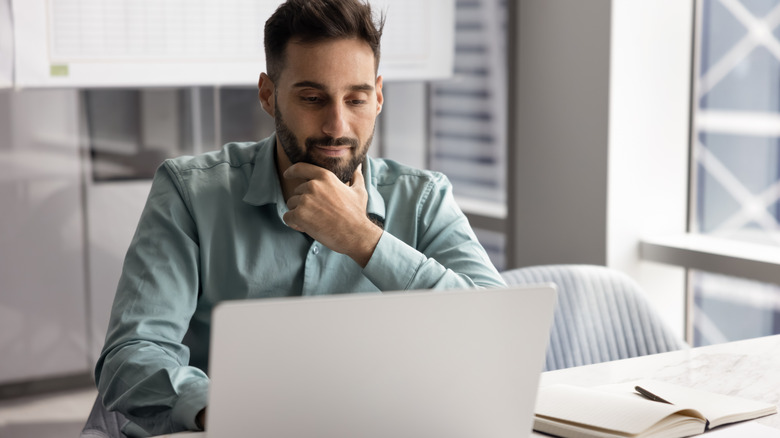 A person using a computer.