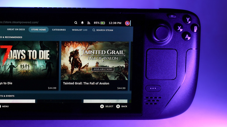 The Steam Deck over a purple backlight, showing two games in the Store Home page.