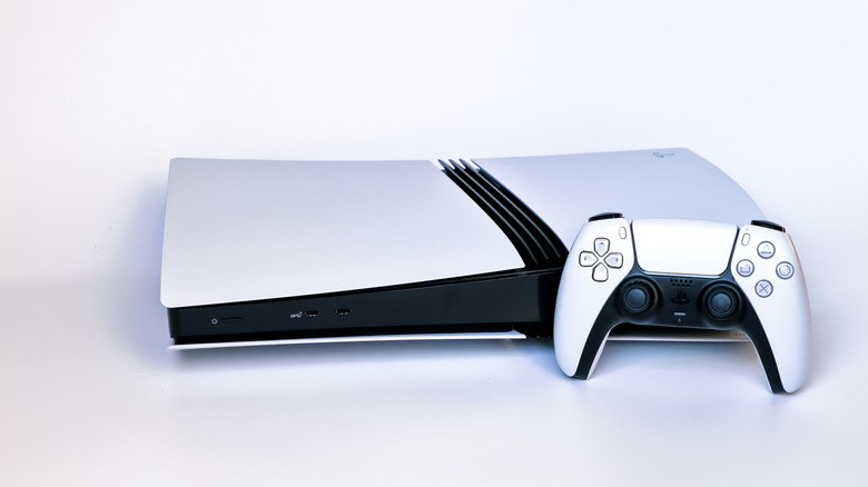 The PS5 and DualSense controller displayed against a white backdrop.