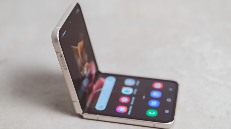 A Galaxy Z Flip 3 open on a table