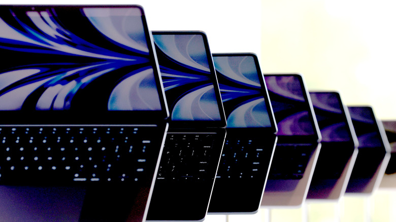 Brand new redesigned MacBook Air laptops are displayed during the WWDC22 at Apple Park