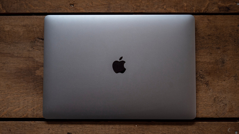 A Macbook with a closed lid.