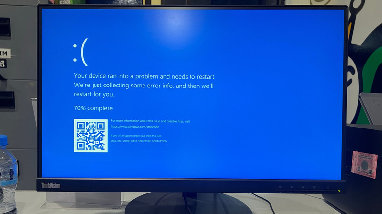 A computer monitor displaying the infamous Blue Screen of Death (BSOD) in Microsoft Windows.