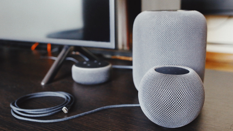 Smart speakers on a desk.