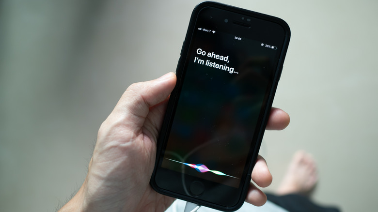 Siri voice assistant activated on a phone.