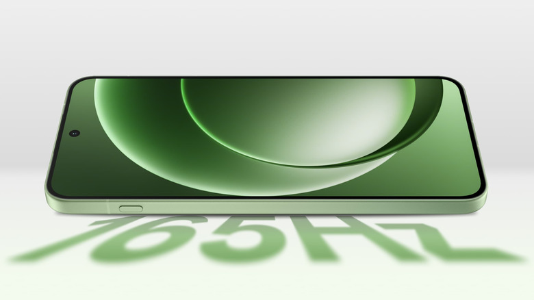 OnePlus 15R with green graphic on screen, and green text below the phone