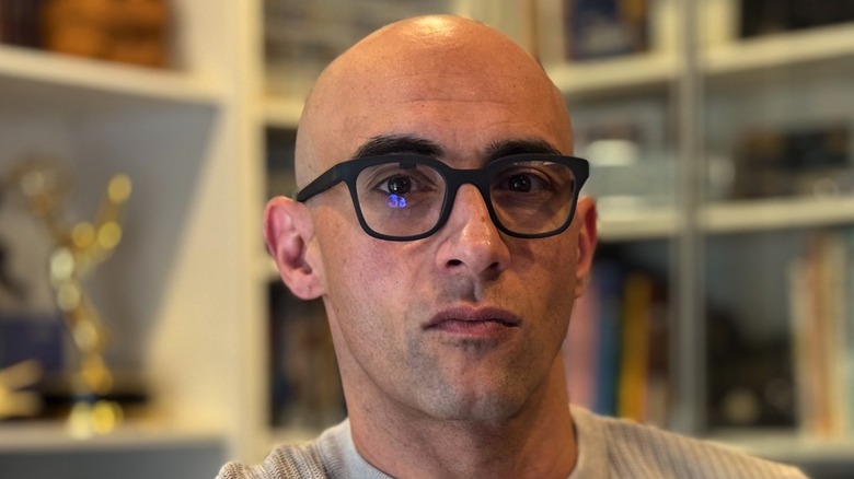 A person wearing the new Halo AI smart glasses.