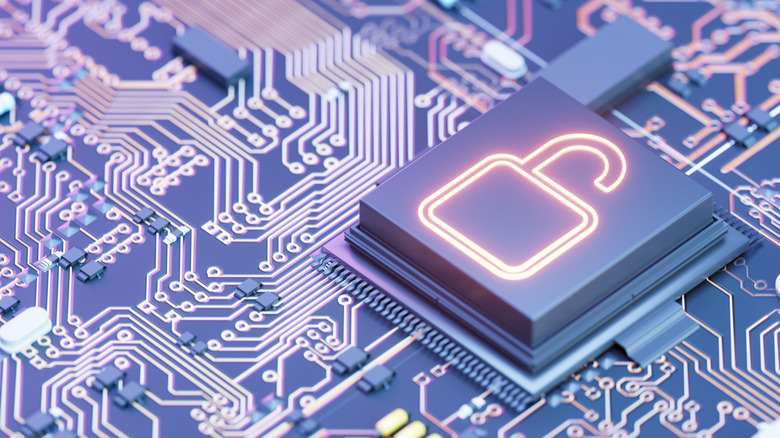 A concept image showing a computer chip with a glowing icon of an open padlock, seated in a circuit board.
