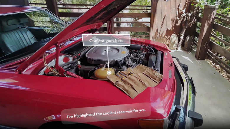 An AR overlay showing a Snap SPECS smartglasses user where to pour coolant under a car's hood