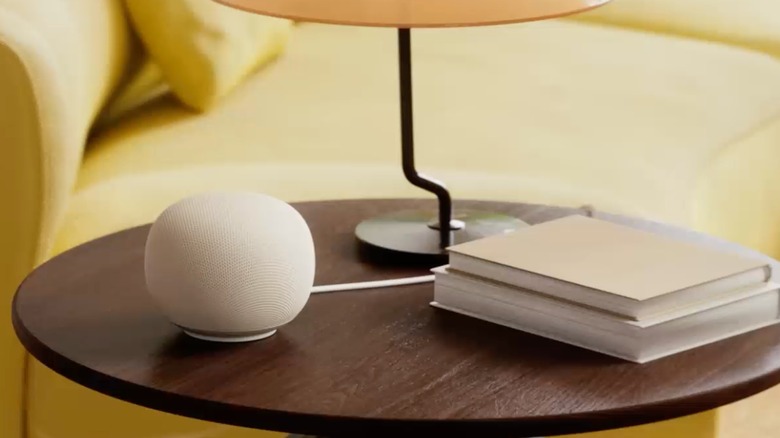 A white Google Home Speaker.