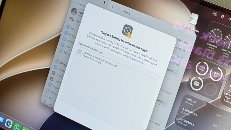 Close-up shot of MacBook Pro's display showing software still running Rosetta 2