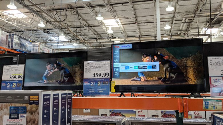 TCL TV on a display shelf