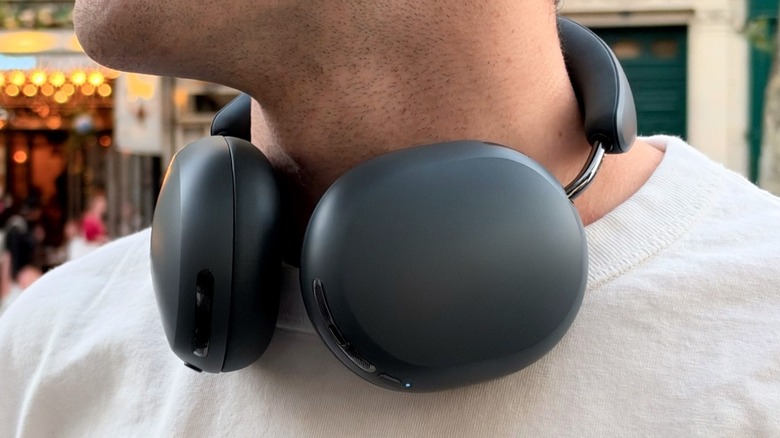 Sonos Ace Ultra headphones around a man's neck