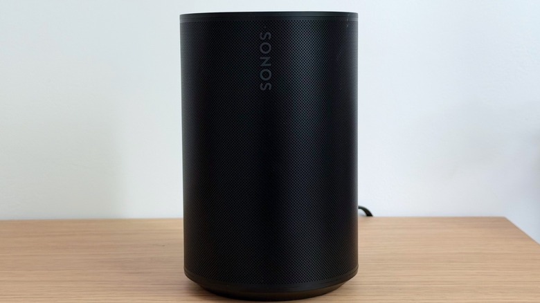 Sonos Era 100 SL speaker on a table
