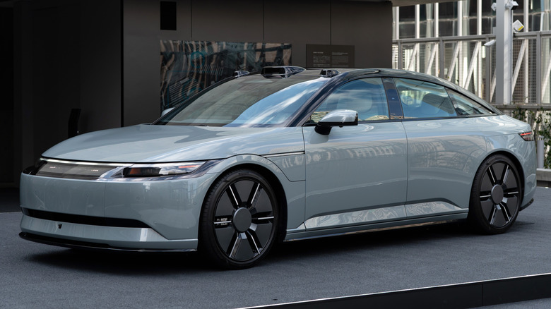 Afeela logo on sign behind top of EV's sensor array