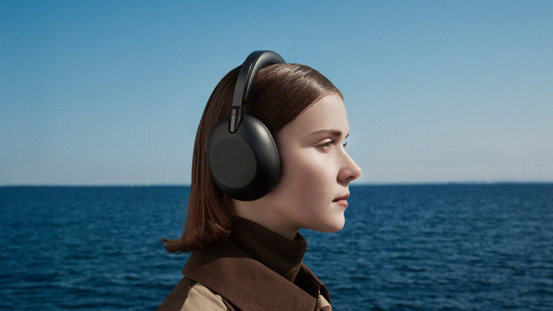 Woman wearing the Sony 1000X The ColleXion headphones