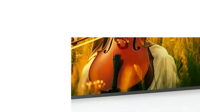 The Sony Bravia Theater Bar 7 sitting on a table below a wall-mounted TV.