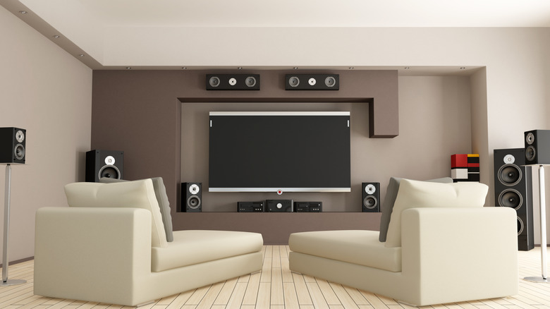 A massive surround sound system set up in a modern living room.