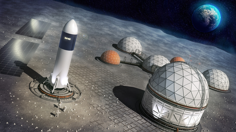Concept of a moon base with rocket prepared for takeoff
