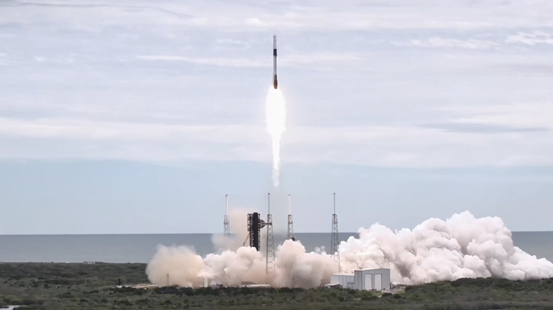 A SpaceX Falcon 9 rocket leaves the launch pad, carrying Crew-13 to the International Space Station.