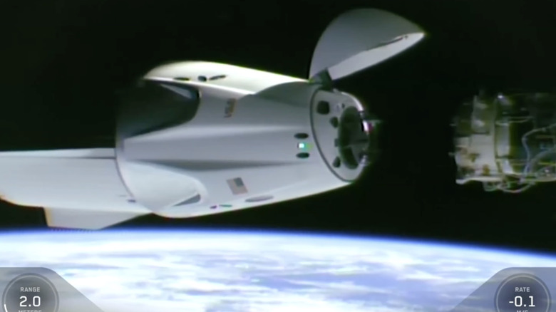 SpaceX's Crew-13 Dragon spacecraft just two meters away from an ISS docking port.