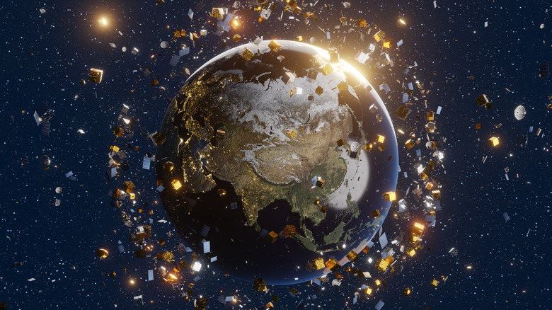 Conceptual image of space debris surround Earth in low orbit.