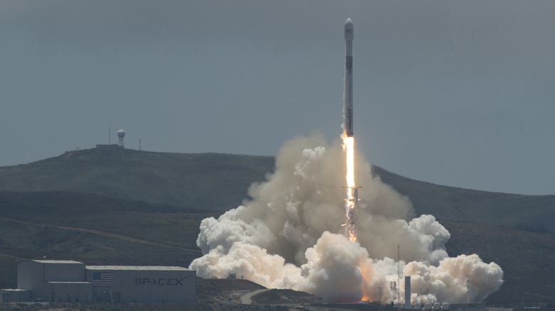 A SpaceX Falcon 9 rocket launches from Vandenberg Air Force Base in California in 2018.