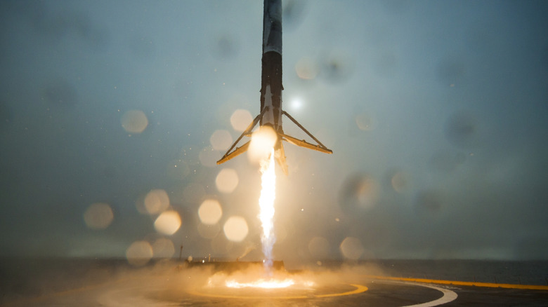 The first stage of a Falcon 9 coming into land on a droneship in 2018.
