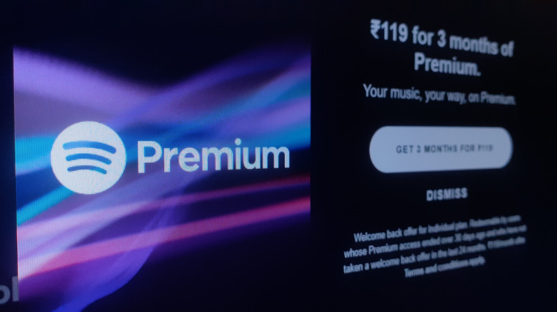 Spotify premium ad showing three months for free option