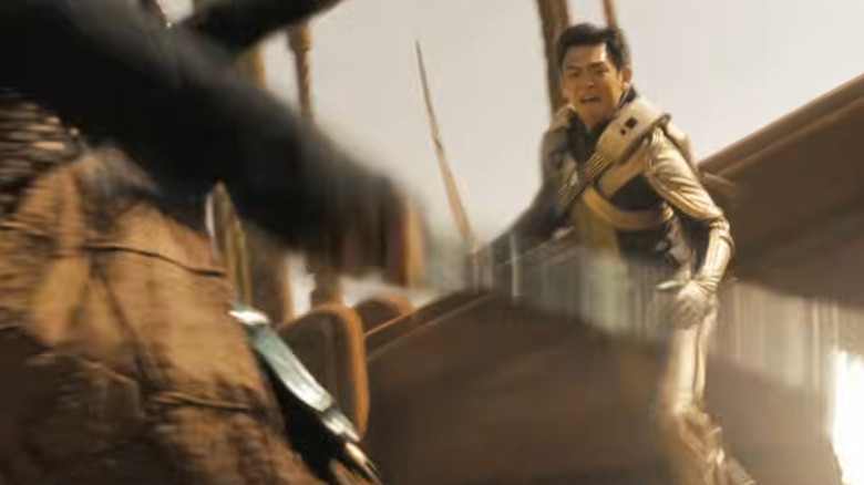 Sulu (John Cho) with sword engaged in combat