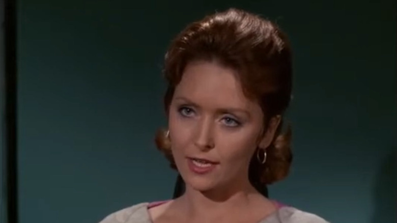 Sandra Smith as Janice Lester, playing Kirk