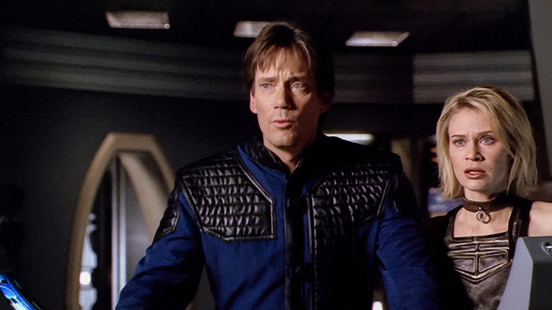 Dylan Hunt (Kevin Sorbo) and Beka (Lisa Ryder) standing next to each other on 