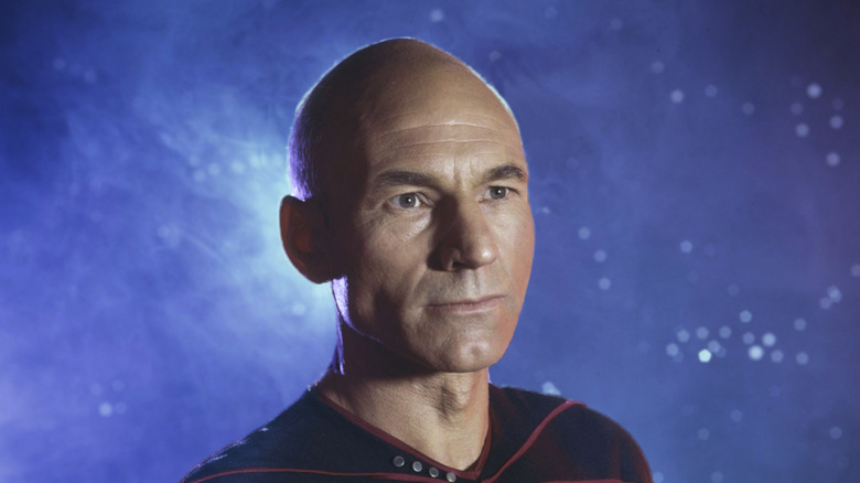 Patrick Stewart posing in promo shot of Captain Picard