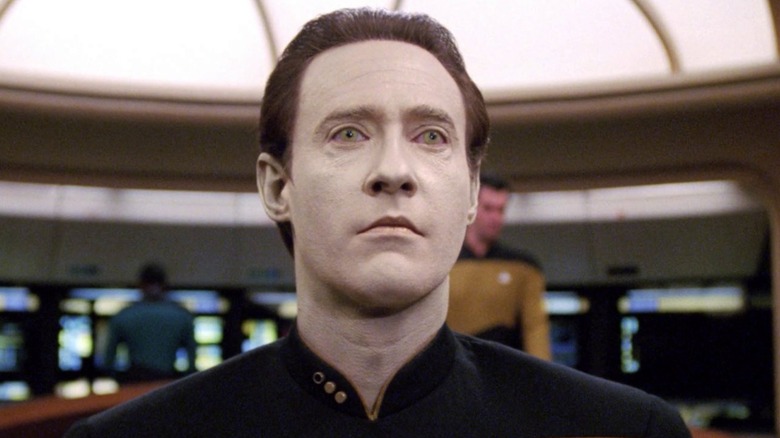 Data (Bret Spiner) standing upright on 