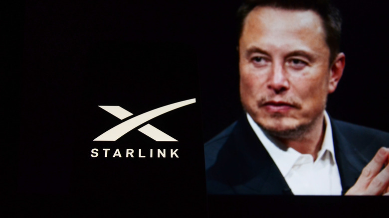Elon Musk next to a Starlink logo on a black background