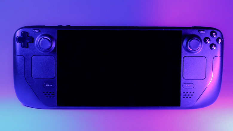 A Steam Deck under blue and purple lighting