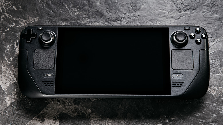 Steam Deck on black marble background