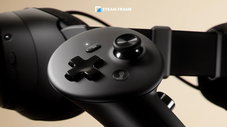Steam Frame controller in front of a Steam Frame headset