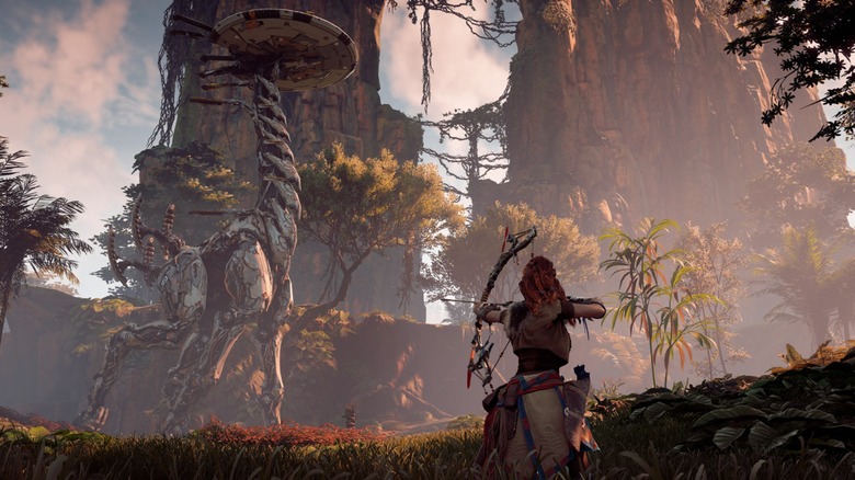 Aloy aiming bow at tallneck in Horizon Zero Dawn Complete Edition